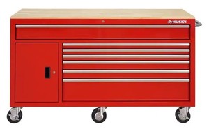 Husky 61 in. W x 22.1 in D Standard Duty 7-Drawer 1-Door Mobile Workbench Tool Chest with Solid Wood Top in Gloss Red, HOTC6107B21M - 2 Broken Casters and slight dent in back.