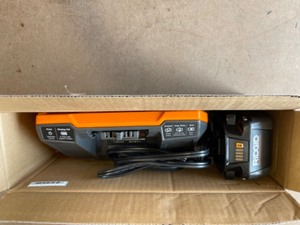 RIDGID 18V Lithium-Ion MAX Output 4.0 Ah Battery and Charger Starter Kit
