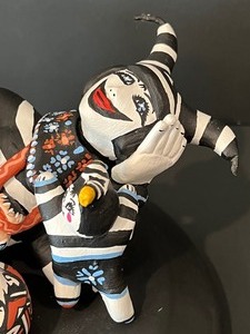 lot 44 image: Storyteller Ceramic Figurine