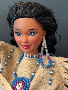 lot 39 image: Collection of Four Native American Barbie Dolls