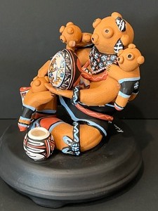 lot 40 image: Storyteller Ceramic Figurine