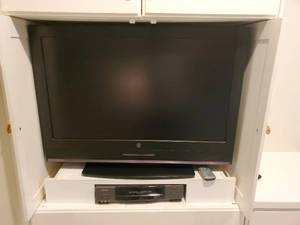 lot 107 image: Television with Built in DVD Player and VHS Player