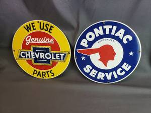 lot 123 image: Ande Rooney Steel and Porcelain Reproduction Chevrolet and Pontiac Signs