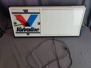 lot 127 image: Valvoline Sign and Wall Clock