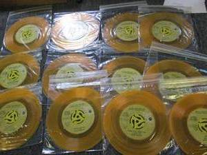 12 elvis 50th anniversary yellow 45...