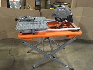 RIDGID 9 Amp Corded 7 in. Wet Tile Saw with Stand, Open Box - Review all pictures