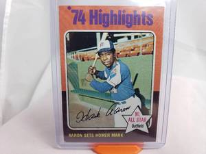 lot 19 image: Hank Aaron 74 Highlights Aaron Sets Homer Mark 1975 Topps