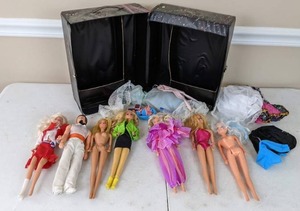 lot 47 image: Fashion Dolls 6 Barbies, 1 Ken, Barbie and the Rockers Doll Case and Variety of Clothing and Accessories