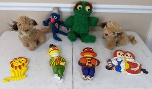 lot 51 image: Vintage Toys Pair of Benji Plush Dogs, Knickerbocker Plushes of Oscar the Grouch and Grover, Wall Decor from Sesame Street and More