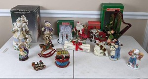 lot 32 image: Christmas Decor Glass and Ceramic Figurines, Ornaments, Musical Victorian Santa, and More