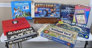 lot 58 image: Collection of 9 Games Battleship, Taboo, Rummikub, Wheel of Fortune, Scattergories, Scotland Yard, Backgammon, and More