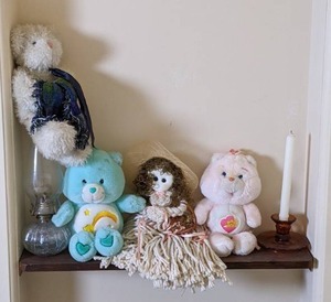 lot 106 image: Vintage Care Bears Wish Bear and Baby Hug Bear, Mop Doll, Kerosene Lamp, and Candlestick and Holder