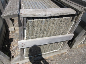 CRATE OF PREFABRICATED GRANITE VANITY SLABS