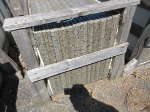 CRATE OF PREFABRICATED GRANITE VANITY SLABS