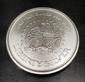 1 TROY OZ .999 FINE SILVER A-MARK LIBERTY ROUND