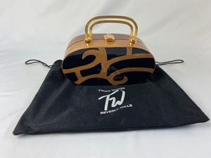 lot 15 image: Timmy Woods Hollywood Collection Lacquered Wood Abstract Design Handbag
