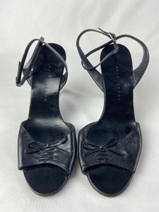 lot 39 image: Vintage Marc Jacobs Black Ankle-Wrap and Peep-Toe Heels with Faux Laces and Front Bow- Made in Italy (8- 8.5)