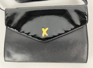 lot 122 image: Paloma Picasso Black Leather Convertible Clutch w Patent Leather Accents