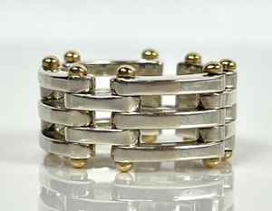 lot 136 image: Vintage Tiffany & Co. Sterling Silver 18K Gold Collapsible Gate Link Ring, Size 7.5