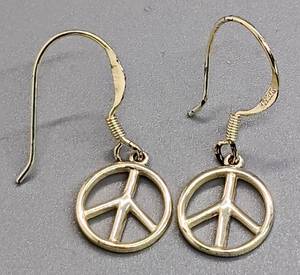 lot 186 image: Like New Anne Klein Watch and Sterling Peace Sign Earrings
