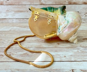 lot 7 image: Fabulous Vintage Mother of Pearl Real Conch Shell Purse w Lucite Closure.