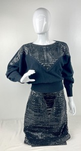 lot 156 image: Lisandro Sarasola by Vicunol Sweater & Skirt Set -Vinyl with Leather Trim, Made in Argentina