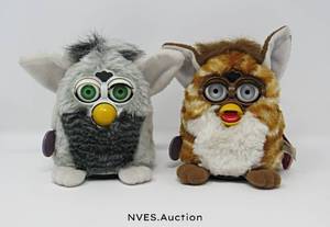 lot 33 image: Two Furbys with original instructions and Furbish-English Dictionaries
