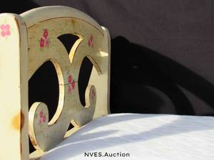 lot 106 image: Vintage wooden toddler bed with waterproof mattress