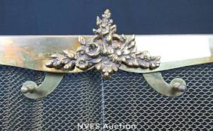 lot 128 image: Metal and Brass fireplace set