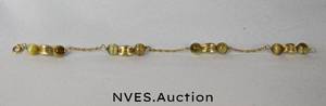 lot 162 image: Gold bead and chain bracelet