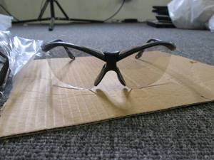 25 lightly tinted safety glasses...