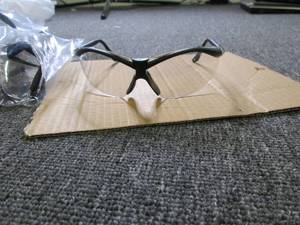25 lightly tinted safety glasses...