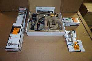 lot 47 image: Pfister Bathroom Faucet with Toilet Paper Holder, Towel Bar and Ring -Brushed Nickel