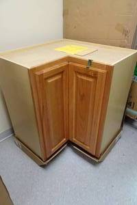 lot 70 image: Hampton Bay Lazy Susan Corner Base Cabinet  -Oak
