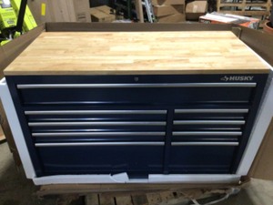 52 in. W x 25 in. D Standard Duty 9-Drawer Mobile Workbench Tool Chest with Solid Wood Top in Gloss Blue by Husky Customer Returns See Terms on Auction