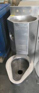 Stainless steel all in one toilet and sink - great for a tiny house