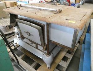 Vintage Quick Meal Stove waiting for a restoration, pale blue