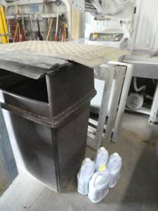 Garbage can, anti fatigue mats and 4 gallons of cleaner