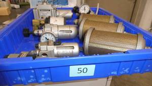 Bin of air filters and regulators - bin not included
