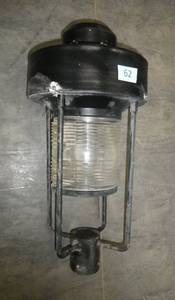 A very neat vintage lamp with a lighthouse looking glass