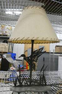 Metal duck lamp and a bull elk oil painting