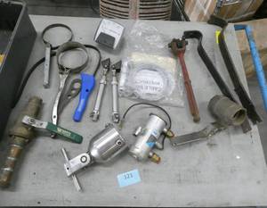 Misc tools, brass valves, oil filter wrenches, crow bar etc