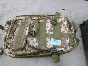 Like new small camo backpack with lots of zipper pouches
