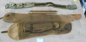 OLD case to carry what I am guessing would be a black powder stick to pack the powder, I did find a 3rd section, see last picture. Then a army ammo belt.