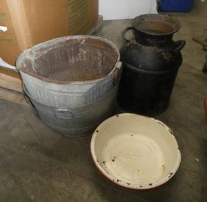 Lot of primitive tin, wash buckets, bushel bucket and milk can