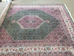 8x10 ft Oriental rug with some wear