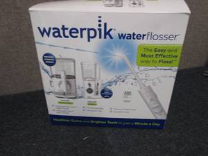 Waterpik Water Flosser open box...