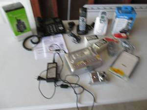 5 phones and a Kodak easy share pri...