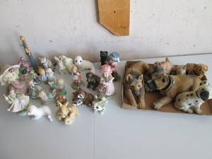 Dog statues and bobble heads and se...