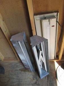 2 metal saw horses and a light (see...